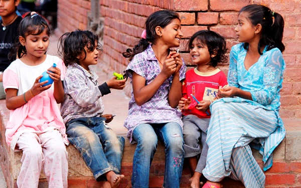 A group of girls hanging out near Durbar Square in Patan.